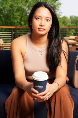 woman sitting on the patio with coffee cup